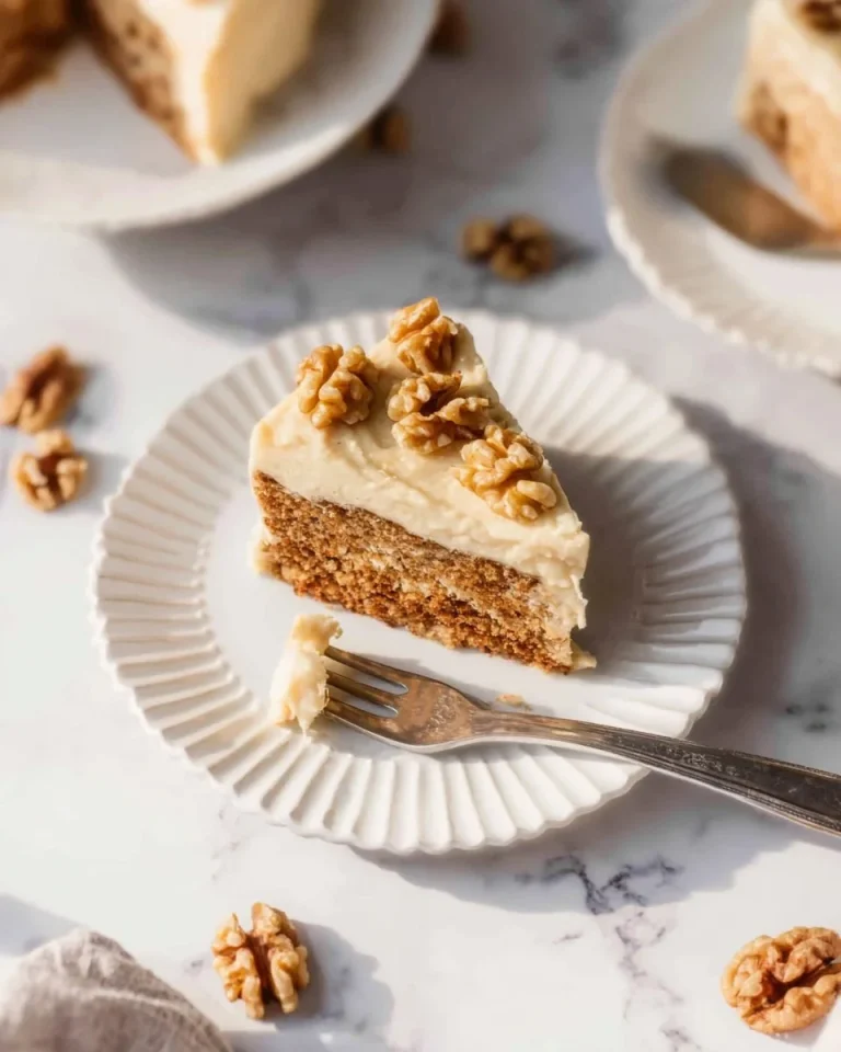 Delicious homemade Applesauce Cake served with a slice on a plate.