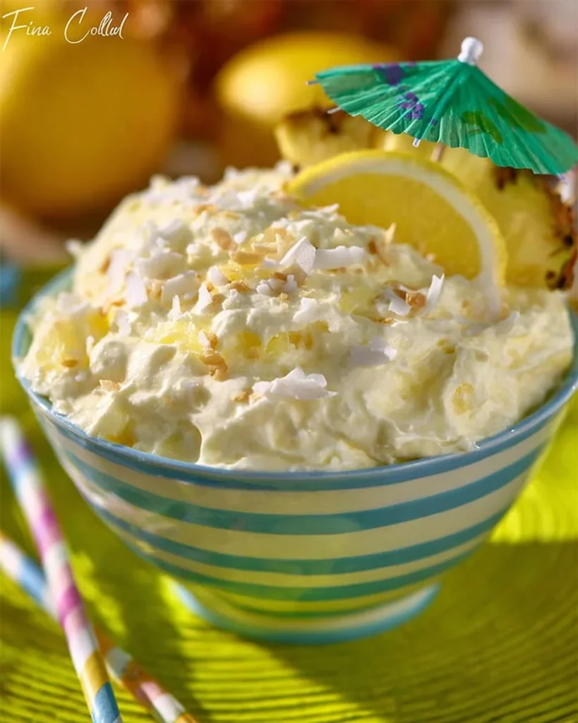 Delicious Pina Colada Fluff dessert featuring coconut and pineapple.