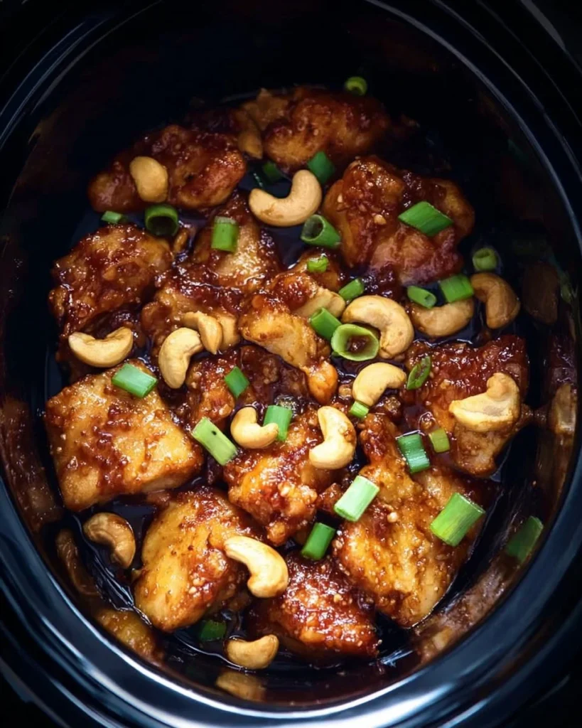 Delicious Air Fryer Cashew Chicken garnished with cashews and vegetables