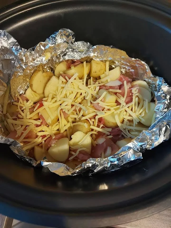 Delicious loaded potatoes topped with cheese, bacon, and sour cream