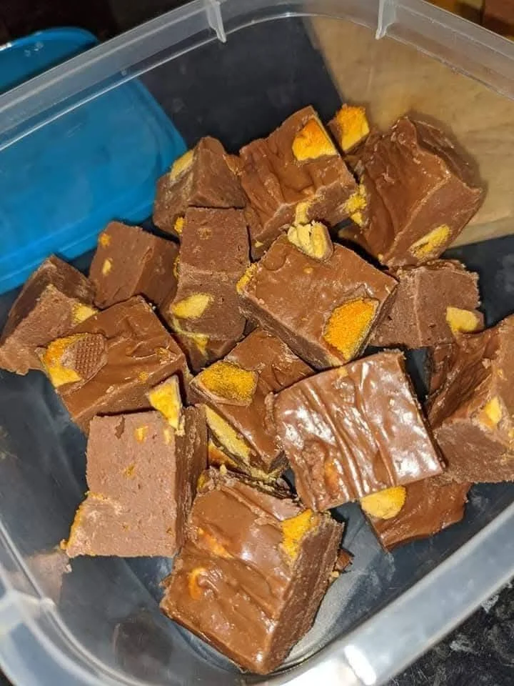 Delicious slow cooker crunchie fudge in a baking dish, ready to serve.