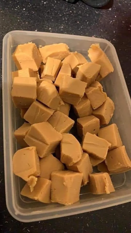 Delicious homemade white chocolate fudge served on a decorative plate