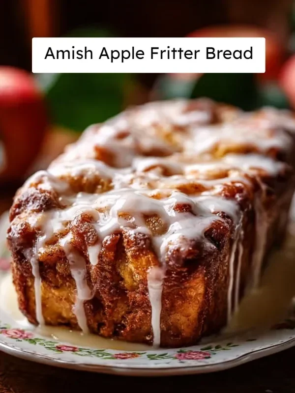 Loaf of Amish apple fritter bread with glaze and apples