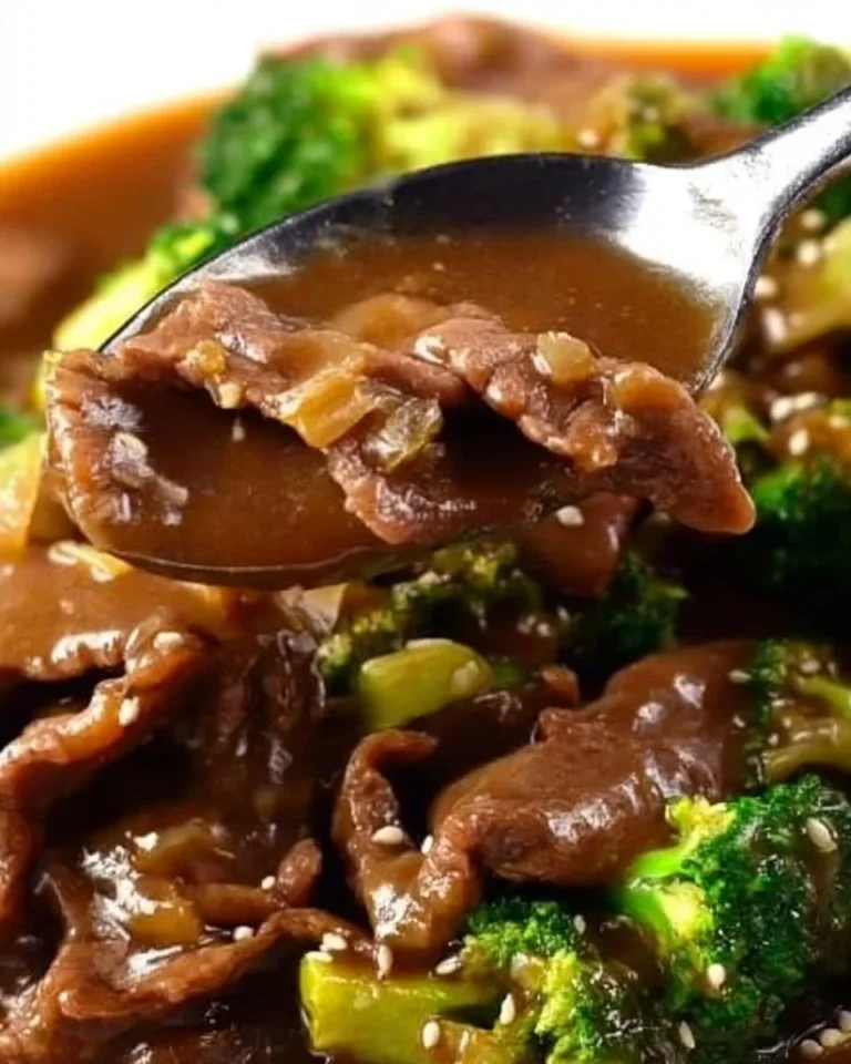 Plate of beef and broccoli stir-fry with vibrant vegetables