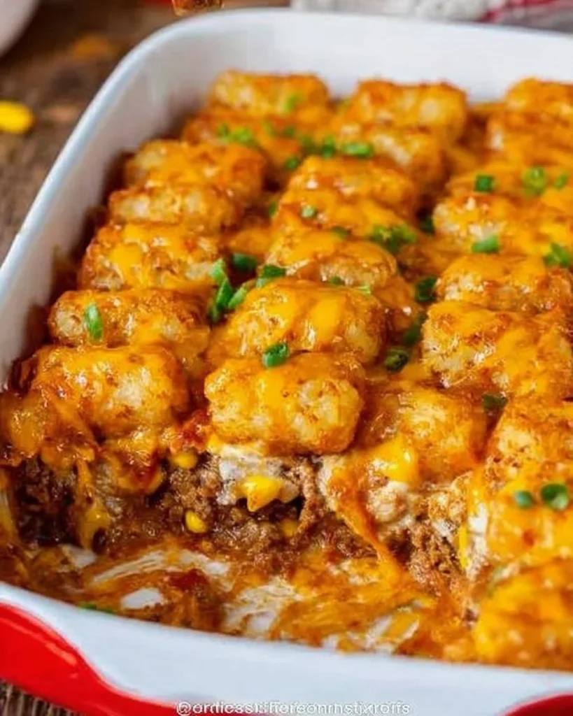Delicious cowboy casserole served in a baking dish with toppings