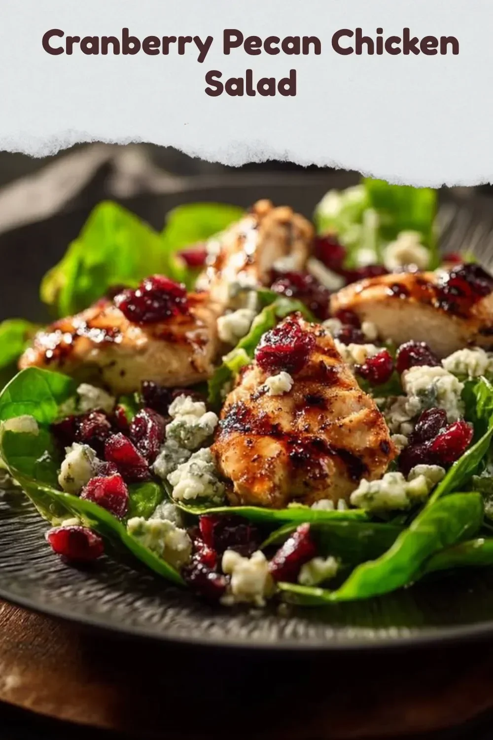 Cranberry Pecan Chicken Salad featuring chicken, pecans, and cranberries on a plate