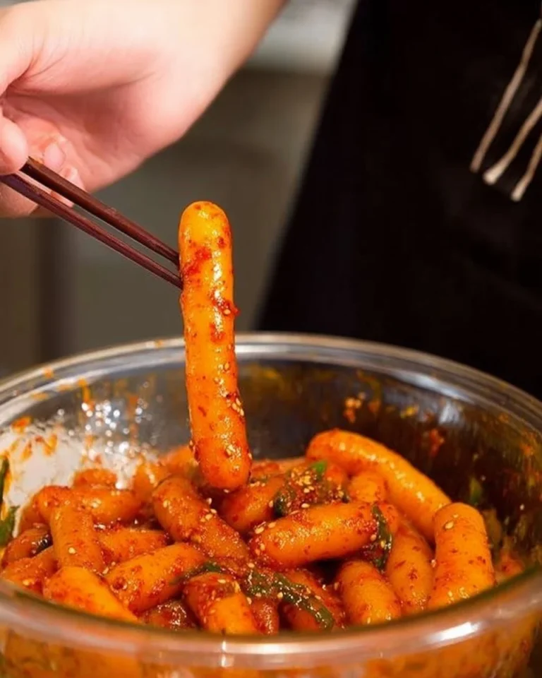 Delicious spicy potato noodles garnished with fresh herbs and spices
