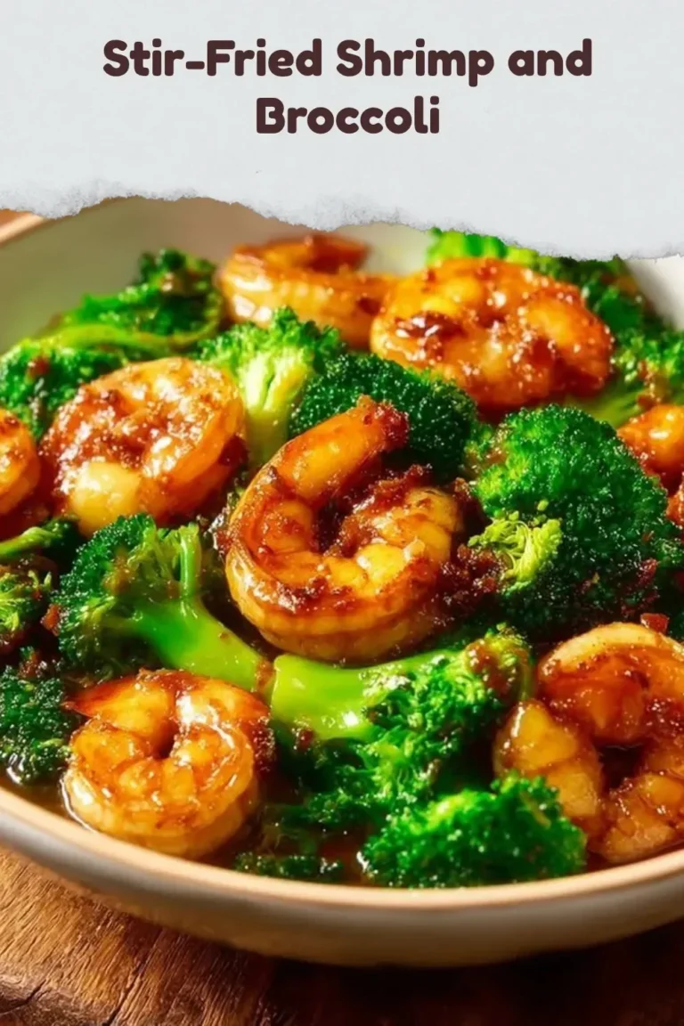 Stir-fried shrimp and broccoli dish garnished with sesame seeds