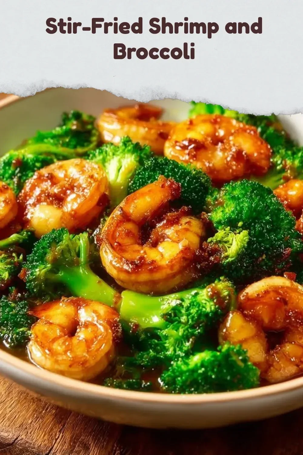 Stir-fried shrimp and broccoli dish garnished with sesame seeds