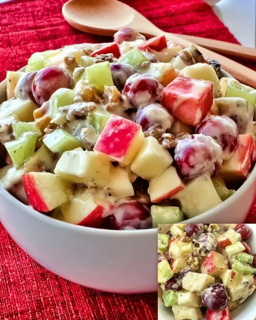 Fresh Apple and Grape Salad in a bowl, garnished with mint leaves