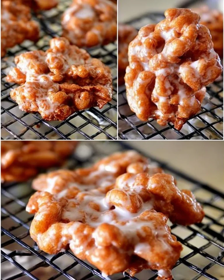 Freshly made apple fritters with a golden brown exterior and apple chunks.
