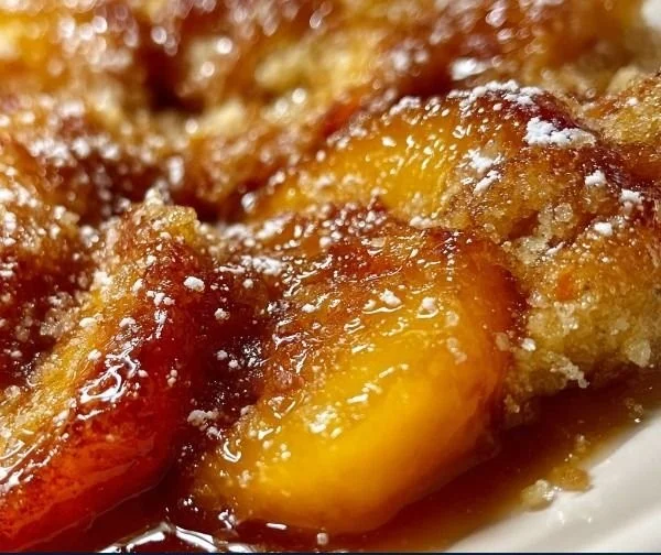 Delicious brown sugar peach cobbler with juicy peaches and golden crust