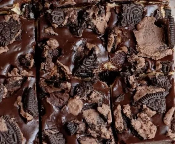 Decadent Brownie Bottom Bars with a rich brownie layer and cookie crust.