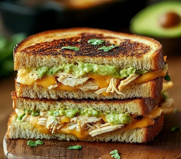 Delicious Chicken Avocado Melt sandwich with grilled chicken, avocado, and melted cheese