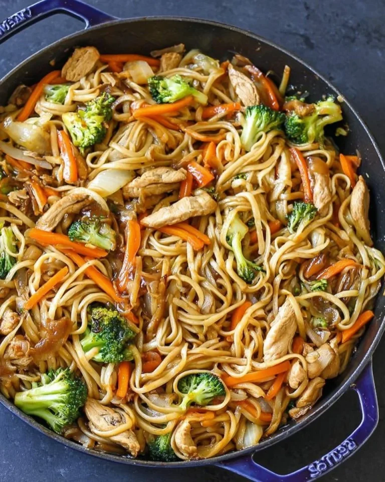 Bowl of Chicken Lo Mein with vegetables and noodles