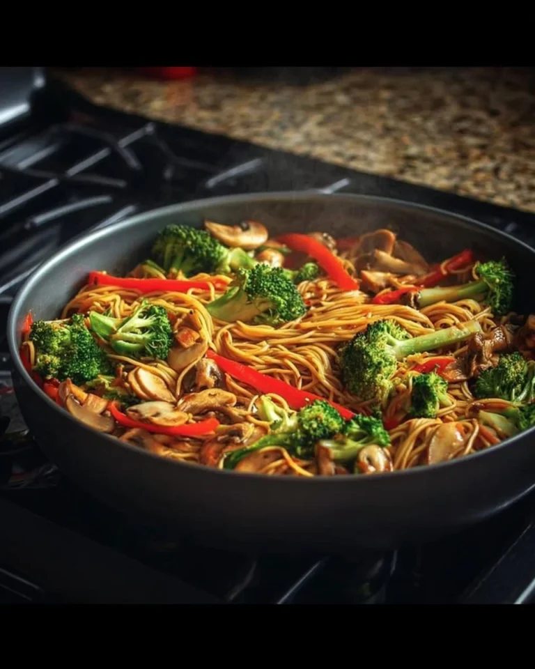 Delicious Chinese style spaghetti with vibrant vegetables and savory sauce