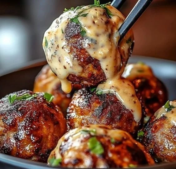 Plate of Korean BBQ Meatballs served with spicy mayo dip