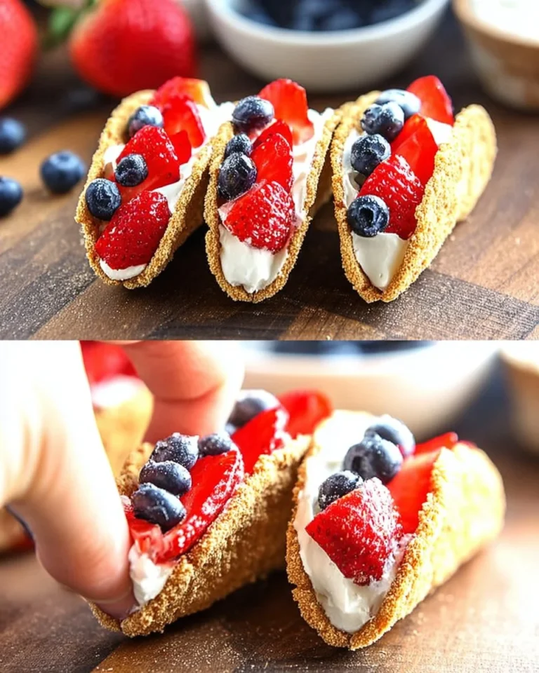 Summer berry cheesecake tacos with fresh fruit topping on a plate.