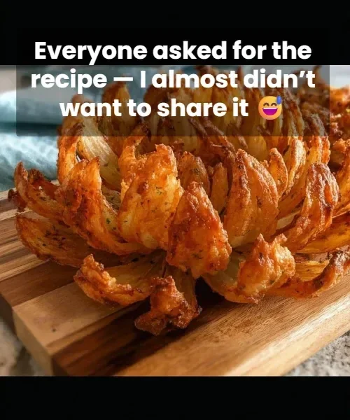 Crispy air fryer blooming onion served with dipping sauce