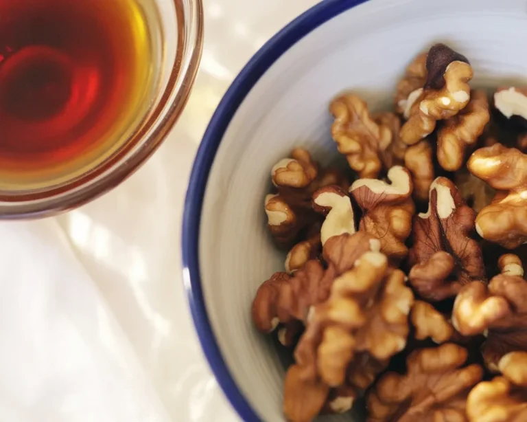 Plate of Sharkaseya, Egyptian-Style Circassian Chicken with walnut sauce and rice.