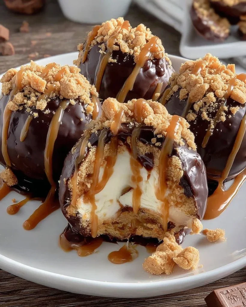 No Bake Peanut Butter Cheesecake Bites served on a plate with a drizzle of chocolate