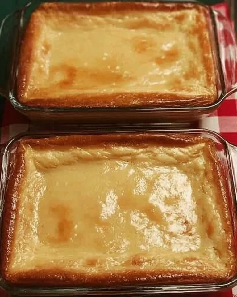 Delicious homemade Ooey Gooey Bars on a wooden table