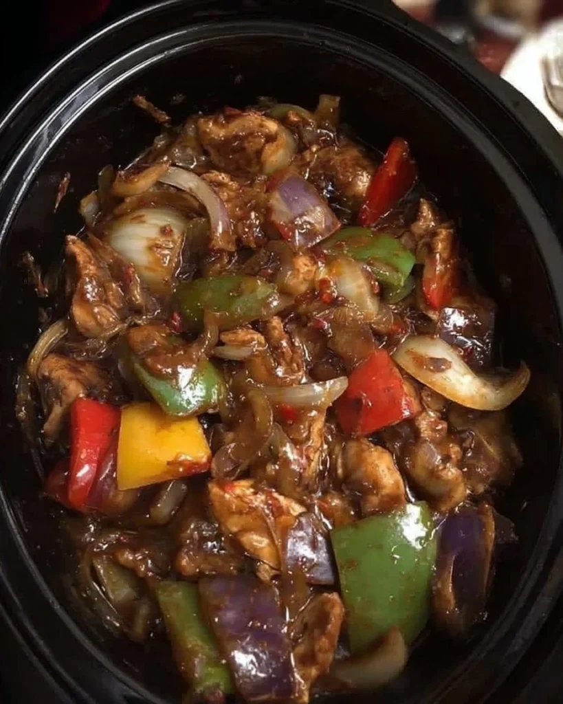 Delicious slow cooker beef in black bean sauce served in a bowl