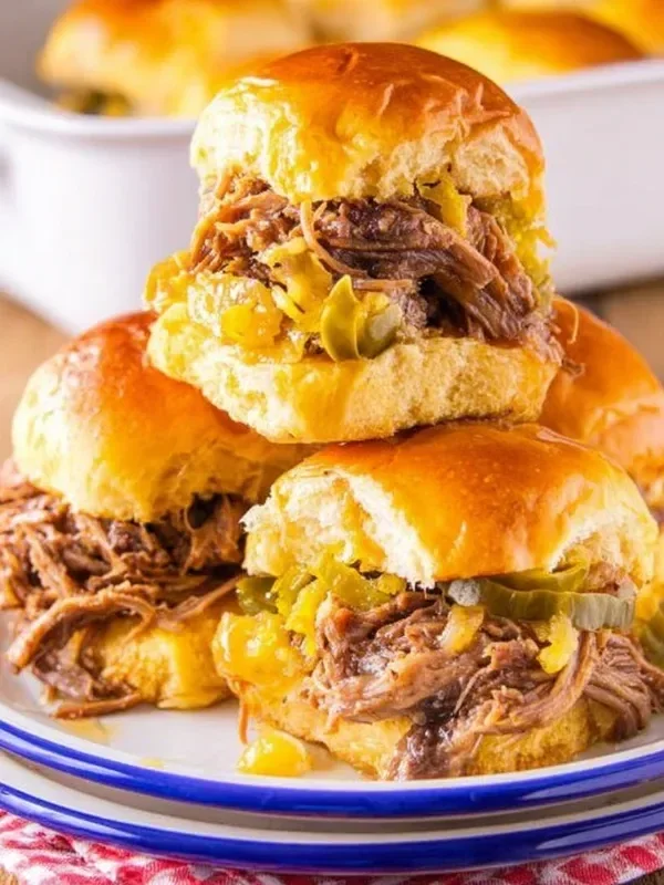 Delicious Slow Cooker Mississippi Pot Roast Sliders ready to serve.