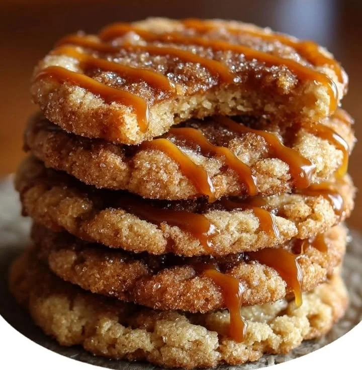 Brown Sugar Cinnamon Caramel Cookies with cinnamon dusting on a plate