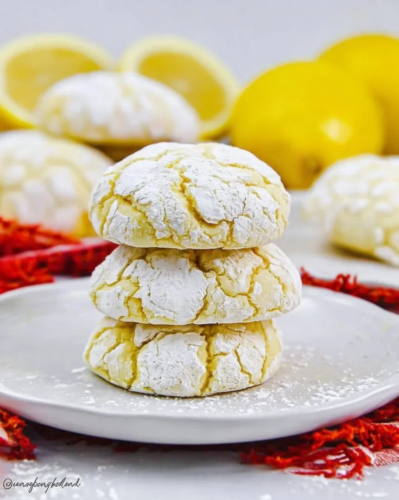 Delicious cream cheese lemon crinkle cookies dusted with powdered sugar