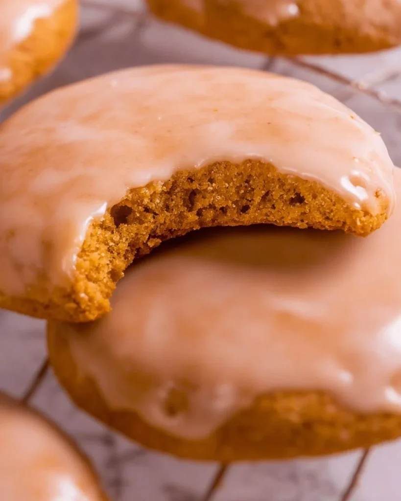 A plate of beautifully decorated gingerbread cookies for the holidays
