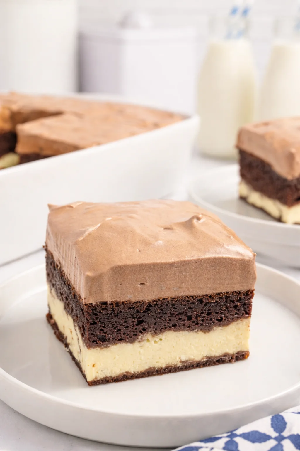 Slice of Italian Love Cake with frosting and decorative toppings