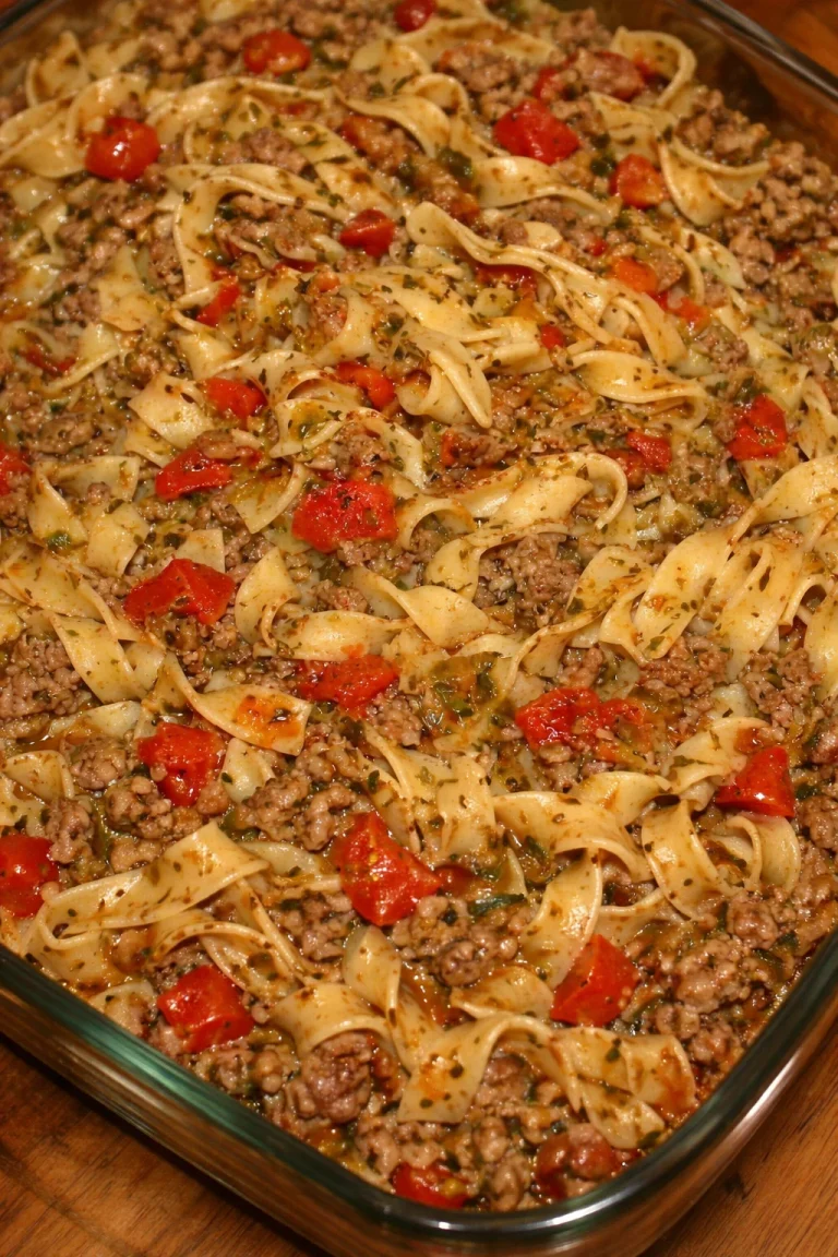 Plate of Italian Style Drunken Noodles garnished with fresh herbs and chilies