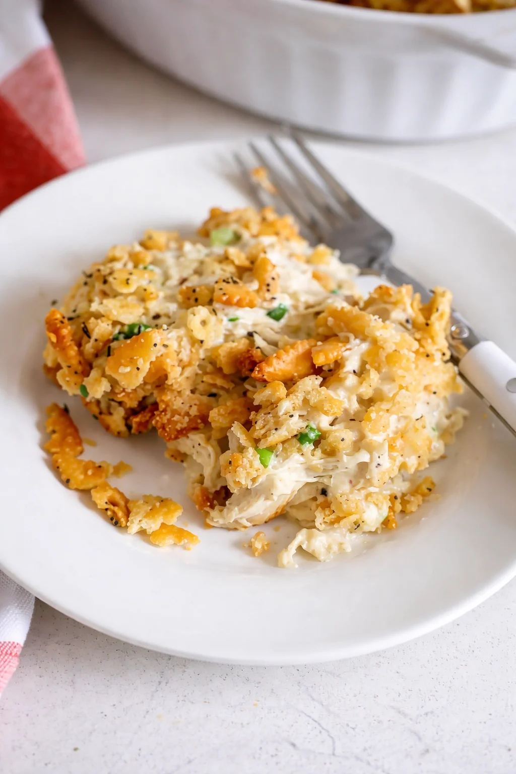Delicious Ritz Cracker Chicken Casserole topped with crunchy Ritz crackers.
