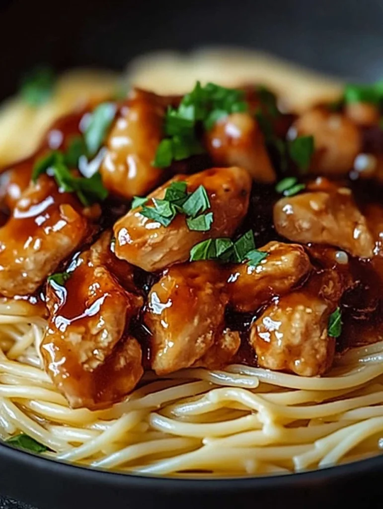 Delicious garlic butter chicken pasta topped with herbs and spices