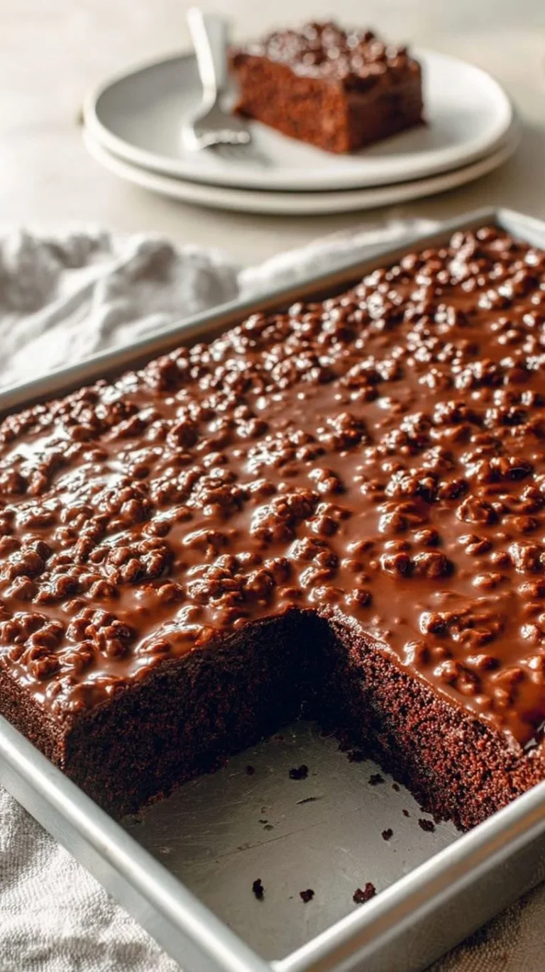 Delicious homemade Texas Sheet Cake topped with chocolate frosting.