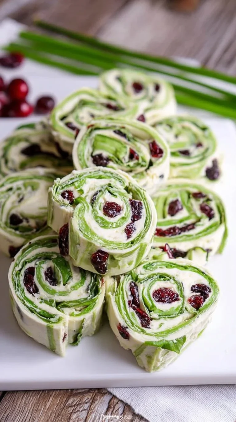 Turkey Cranberry Pinwheels on a serving platter with garnish