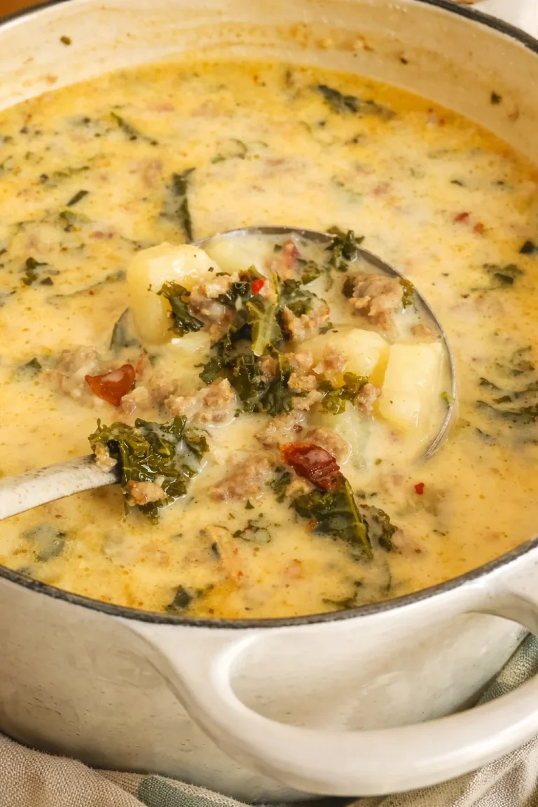 A delicious bowl of Tuscan soup filled with vegetables and olive oil.