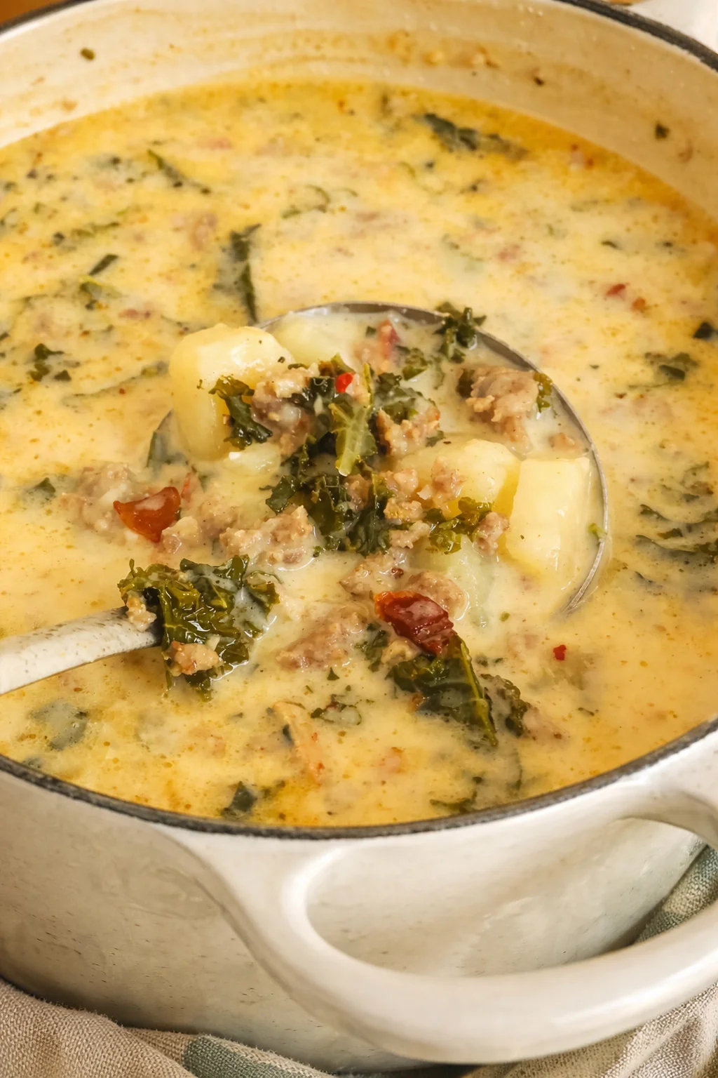 A delicious bowl of Tuscan soup filled with vegetables and olive oil.