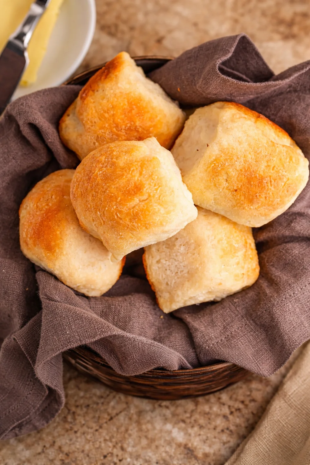 2 Ingredient Dinner Rolls Freshly baked 2 ingredient dinner rolls on a wooden table