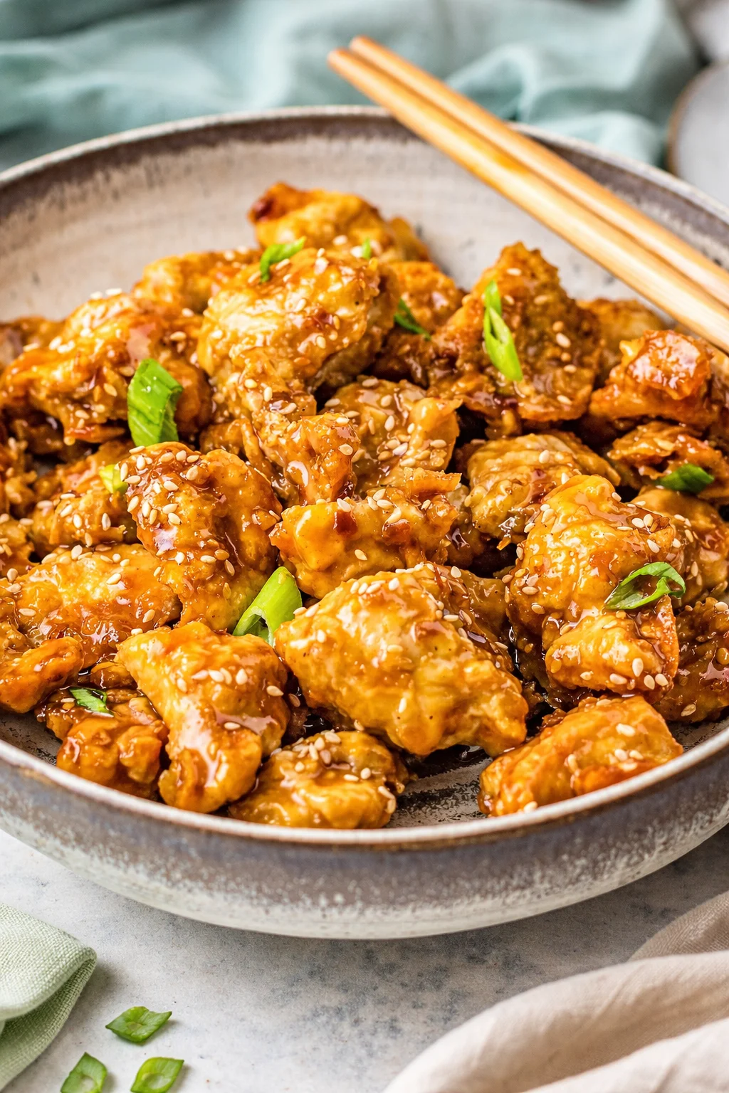 Crispy Air Fryer General Tso's Chicken served with steamed rice and vegetables