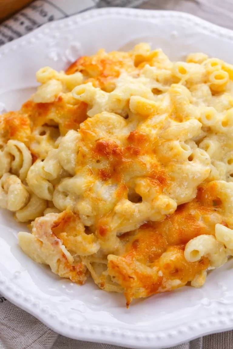 Best ever baked macaroni and cheese served in a dish with bubbling cheese on top