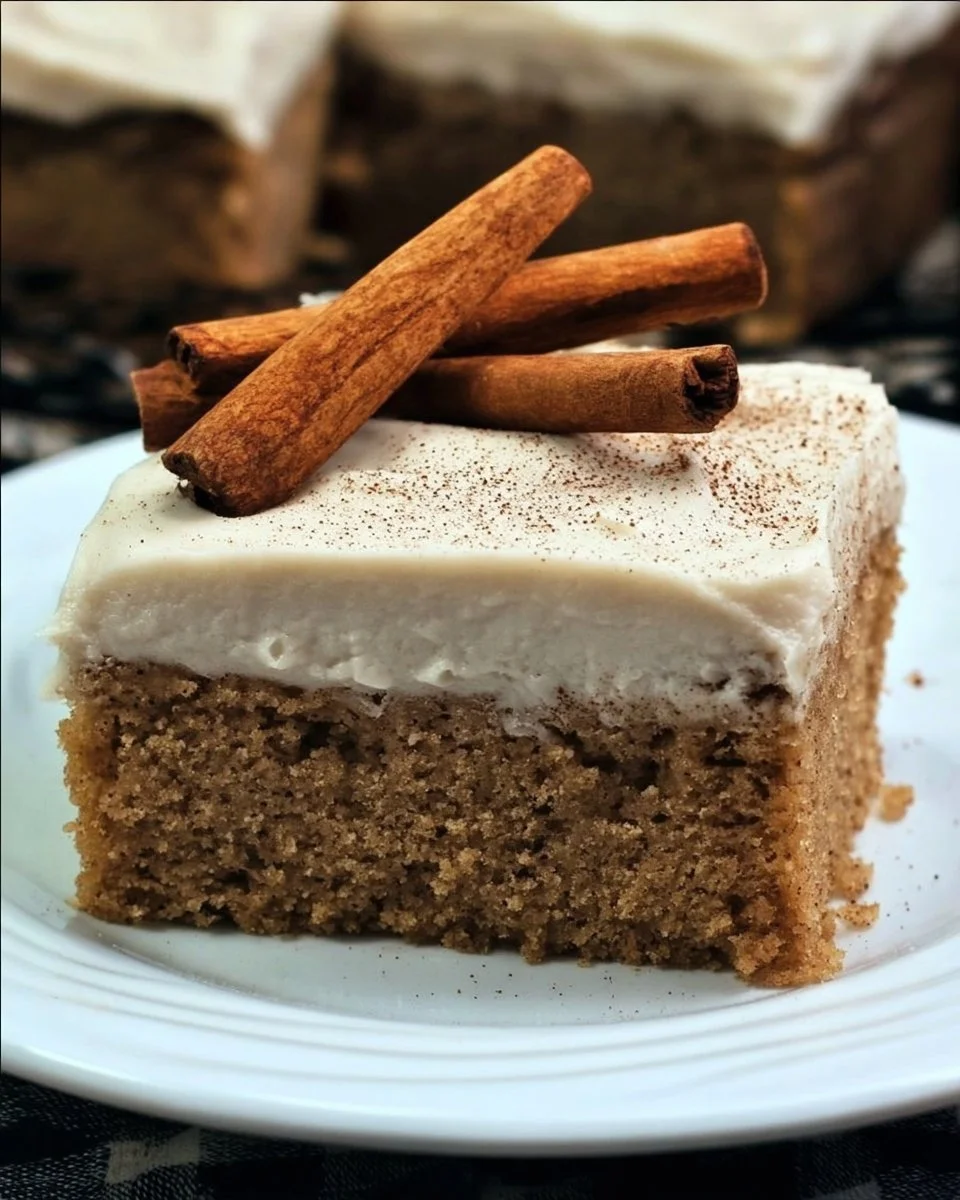Deliciously moist Cinnamon Crazy Cake served on a decorative plate.