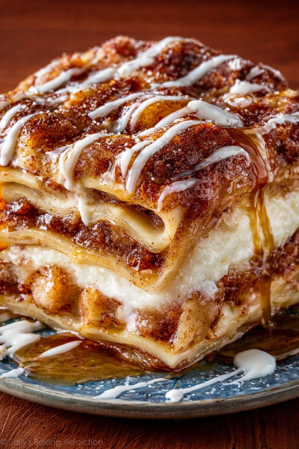 Delicious cinnamon roll apple lasagna dessert with layers of cinnamon and apples.