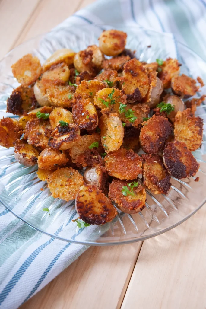 Delicious crispy garlic parmesan potatoes served as a side dish