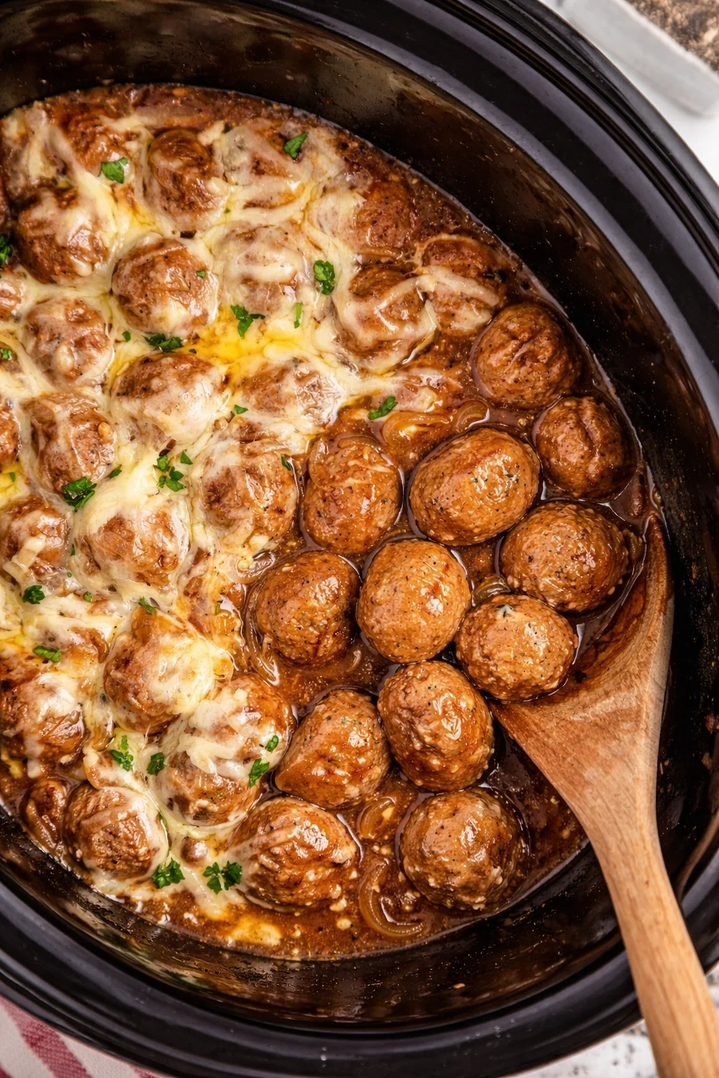 Delicious Crock Pot French Onion Meatballs served in a savory sauce