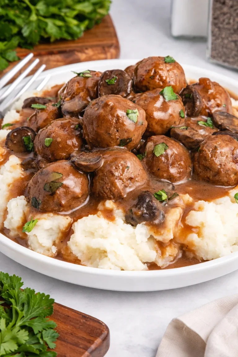 Crock Pot Salisbury Steak Meatballs Crock Pot Salisbury Steak Meatballs served with creamy gravy and mashed potatoes