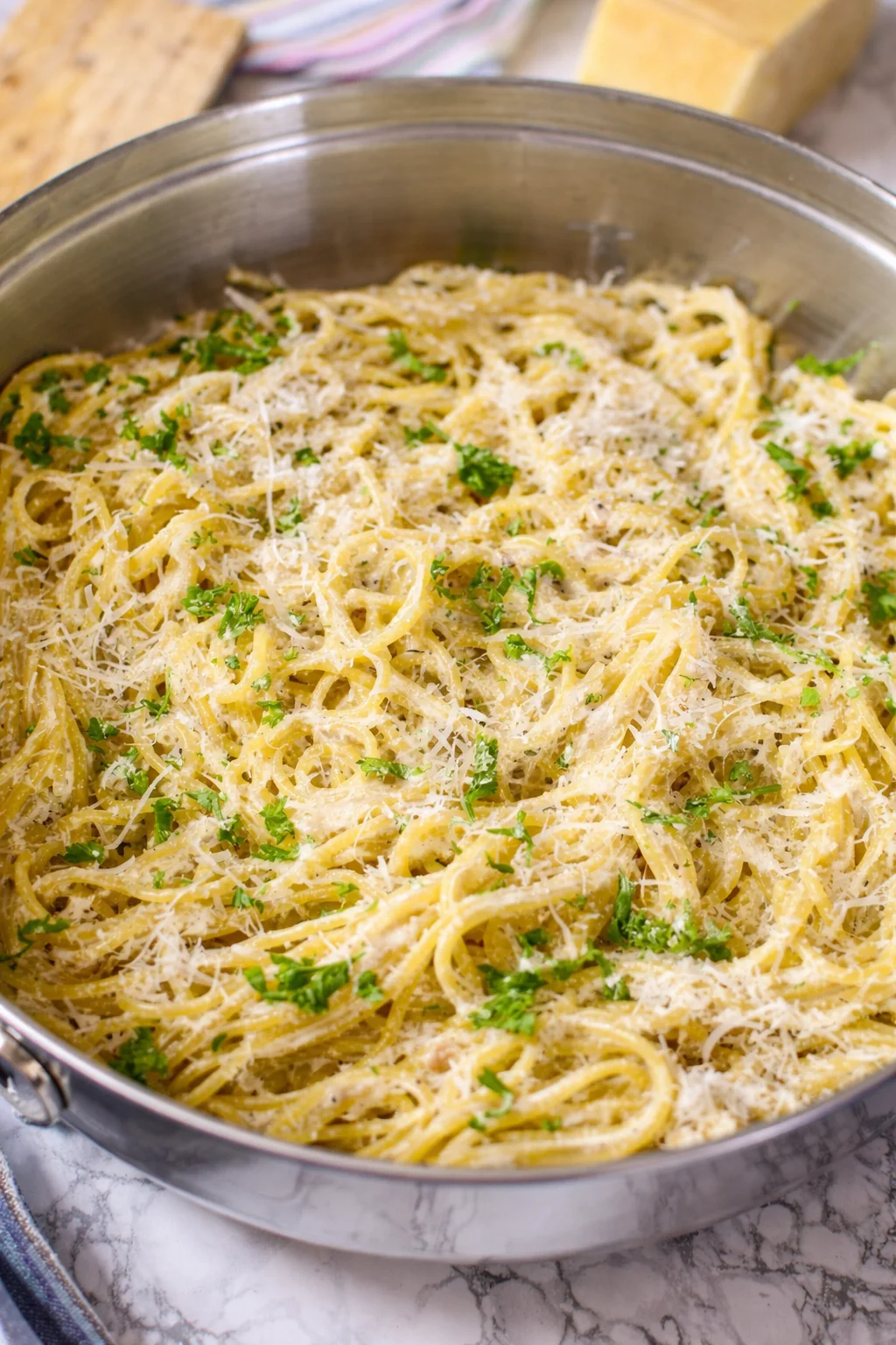 Garlic Parmesan Pasta Delicious bowl of Garlic Parmesan Pasta garnished with herbs