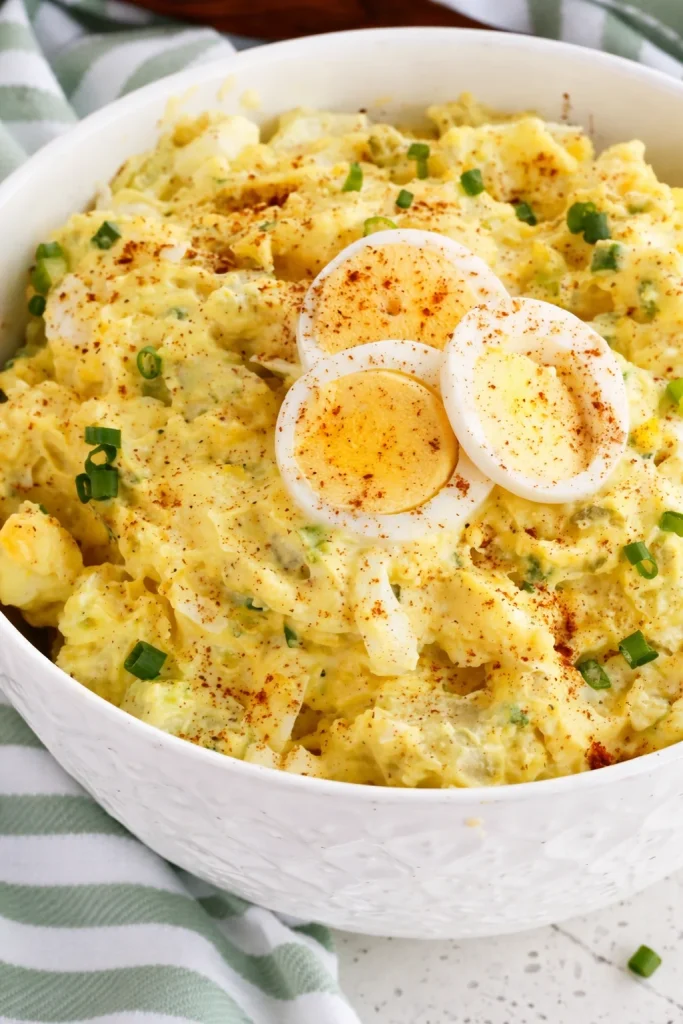 Delicious Southern potato salad with potatoes, celery, and hard-boiled eggs in creamy dressing