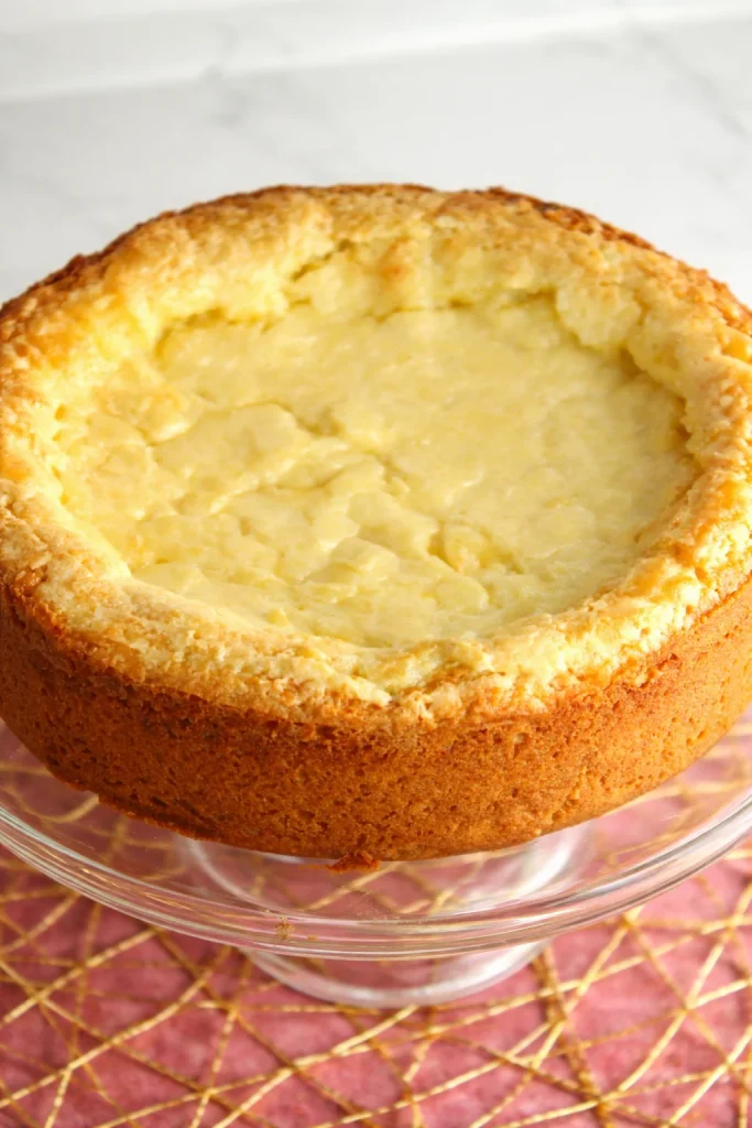 Delicious slice of Paula Deen's ooey gooey butter cake on a plate